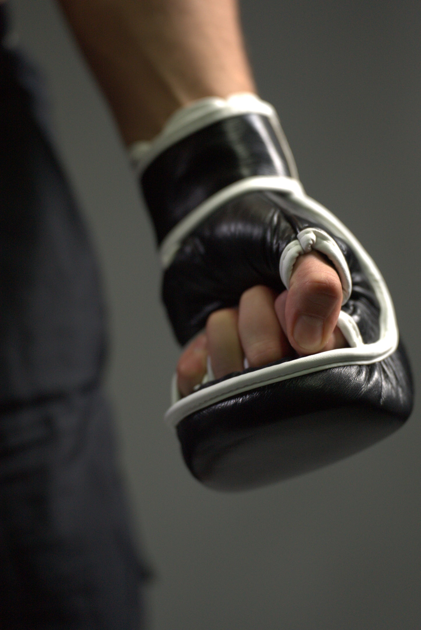 Black MMA sparring gloves with thick padding